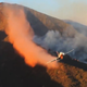 Illustration for article titled Watching This DC-10 Fire Retardant Drop Run Will Make You Queasy